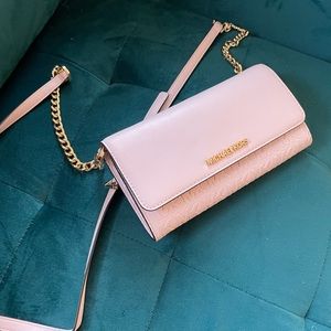 Pink Michael Kors crossbody wallet